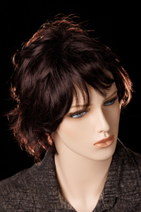 Picture of mannequin in front of RomaPhoto DMKFoto black velvet-like (velour-like) black backdrop for Peter Free review of the backdrop.